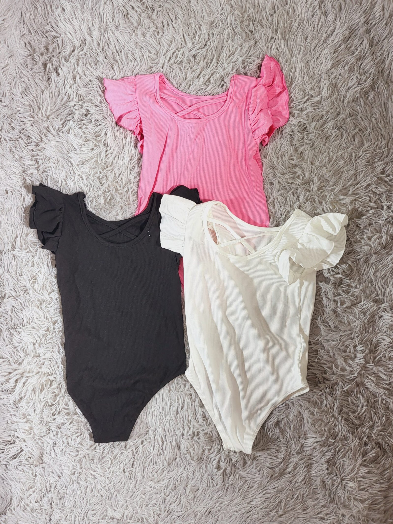 BODY PARA NIÑA ROSADO CON DETALLES MULTICOLOR – ESTILO CASUAL Y CÓMODO